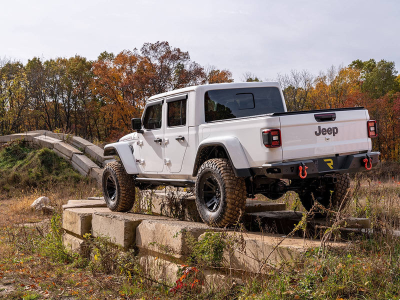 N-Fab TrailSlider step system in textured black, rear three-quarter view, shown with a rear bumper (not included)