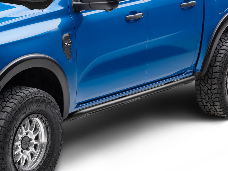 N-Fab TrailSlider step system in textured black, installed along the rocker