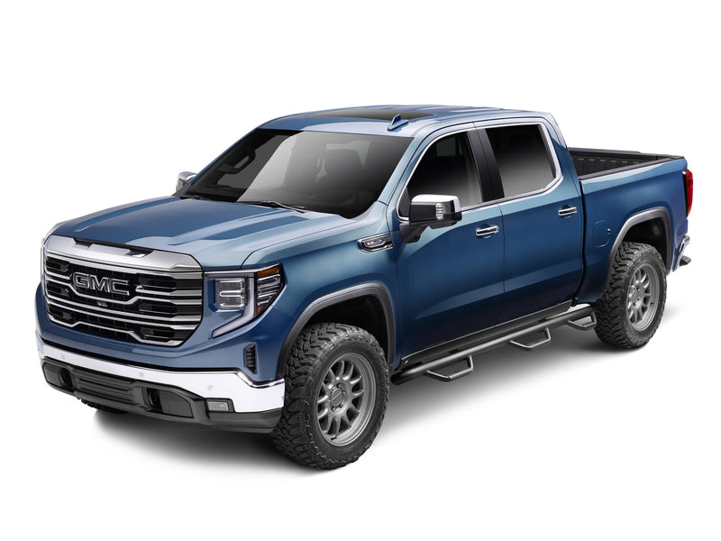 N-Fab wheel to wheel nerf step bars in textured black installed along the rocker of a blue pickup, studio image