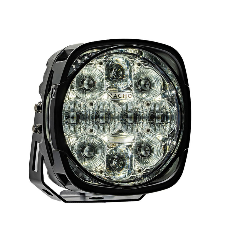 NACHO Grande LED driving light face on, large squared 7 inch housing with a clear lens over four round reflectors at the corners, a row of lenticular optics across the center and two small round optics top and bottom, NACHO lettering on the lens