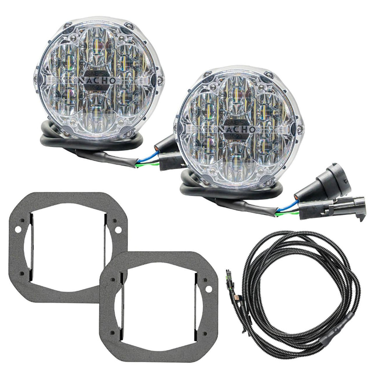 NACHO plug and play fog light kit contents on white: two clear-lens Quatro SAE round lights with pigtail leads and OEM connectors, two flat black bracket plates with rectangular apertures, and a coiled loomed harness