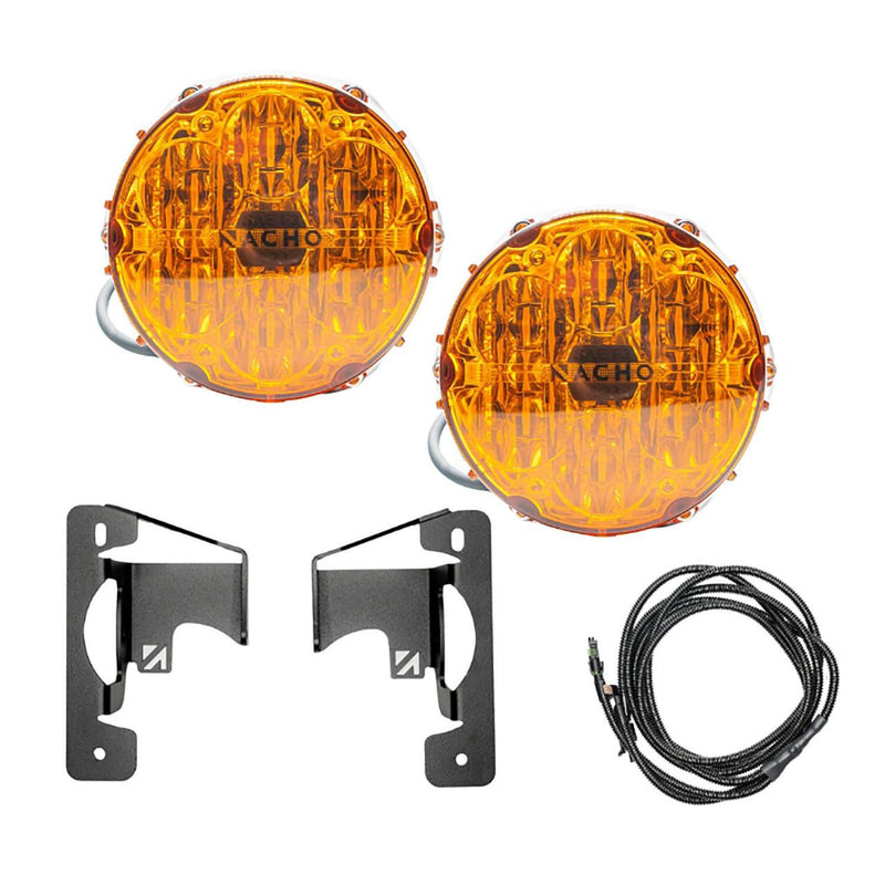 NACHO plug and play fog light kit contents on white: two amber-lens Quatro SAE round lights with pigtail leads, two black mounting brackets and a coiled loomed harness with a fuse tap