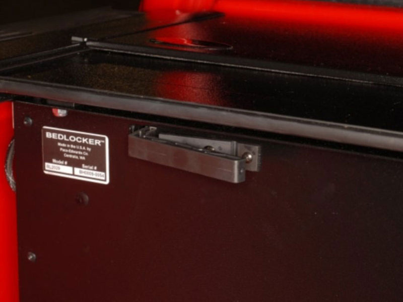 Pace Edwards BedLocker: close-up of the BedLocker canister side with its Pace Edwards model label and metal latch
