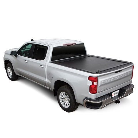 Pace Edwards Full Metal JackRabbit: black retractable cover closed on a silver pickup, studio three-quarter view