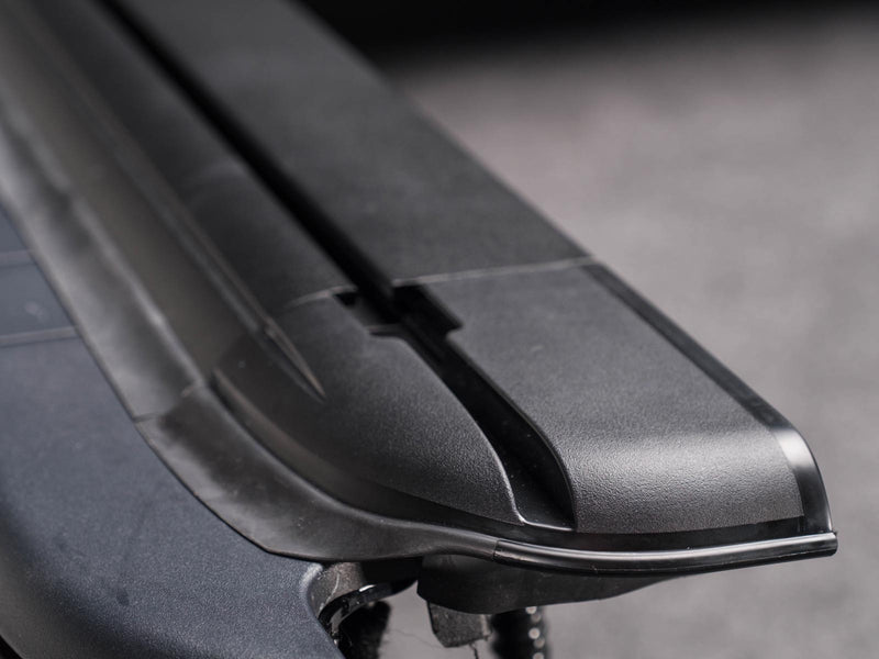 Pace Edwards UltraGroove Electric: close view of the grooved side rail end cap at the rear corner of a closed cover