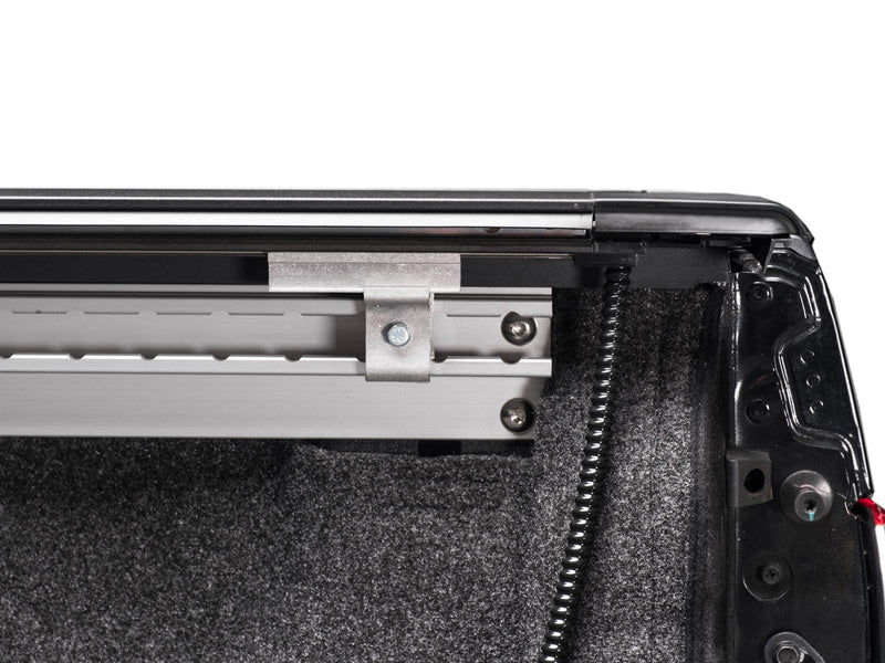 Pace Edwards UltraGroove Electric: inside the bed wall showing side rail, clamp bracket and drain tube