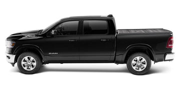 Black 2019 Ram 1500 with a RetraxPRO MX retractable tonneau cover