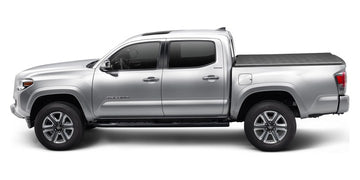 Silver 2020 Toyota Tacoma with an Extang Trifecta 2.0 soft folding tonneau cover