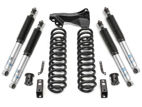 ReadyLIFT 2.5" Coil Spring Front Lift Kit With Bilstein Front and Rear Shocks, full kit on a studio background: front coil springs, four Bilstein shocks and track bar bracket