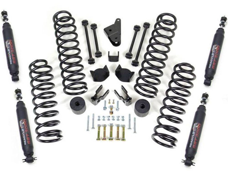 ReadyLIFT 4" Coil Spring Lift Kit With SST3000 Shocks, full kit on a studio background: four coil springs, SST3000 shocks, sway bar end links and brackets