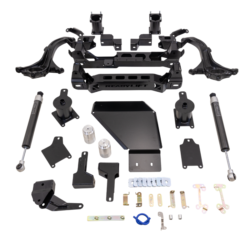 ReadyLIFT Big Lift Kit, full kit on a studio background: ReadyLIFT Tundra kit with knuckles, crossmember, skid plate, spacers, shocks and hardware on a black background, no rear coils