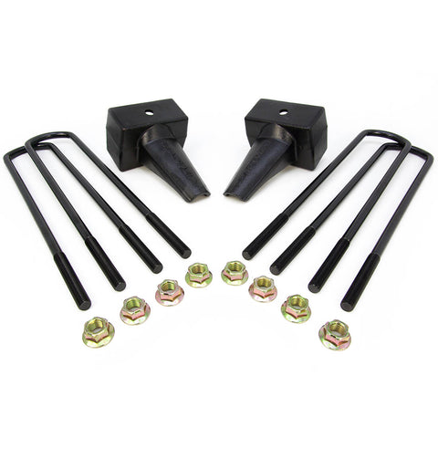 ReadyLIFT Block Kit, full kit on a studio background: two black tapered 4" rear lift blocks with four square black U-bolts and gold nuts on white