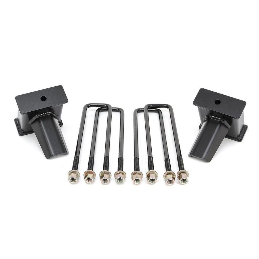 ReadyLIFT Block Kit, full kit on a studio background: two tall black rear lift blocks flanking four black U-bolts with nuts on a white background
