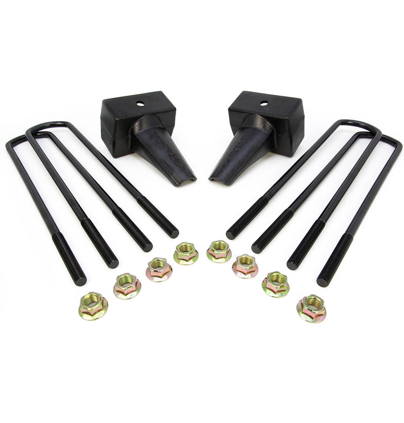 ReadyLIFT Block Kit, full kit on a studio background: two tapered black rear blocks with four U-bolts and nuts on white