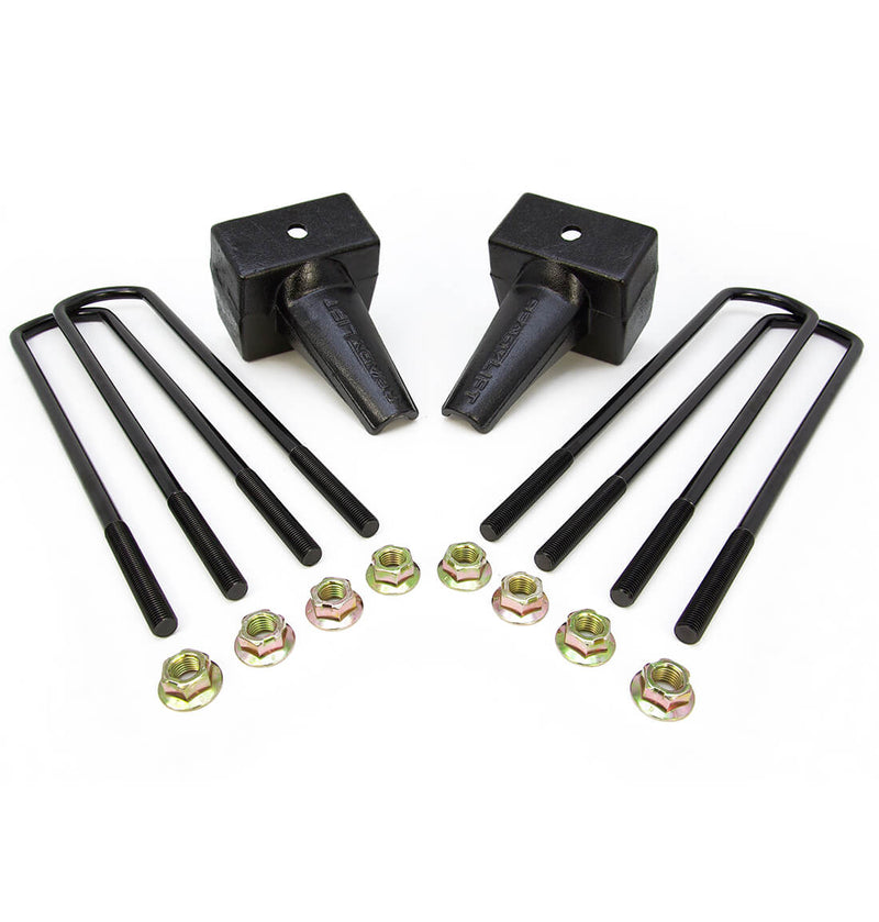 ReadyLIFT Block Kit, full kit on a studio background: two tapered black rear blocks with four U-bolts and flange nuts on white