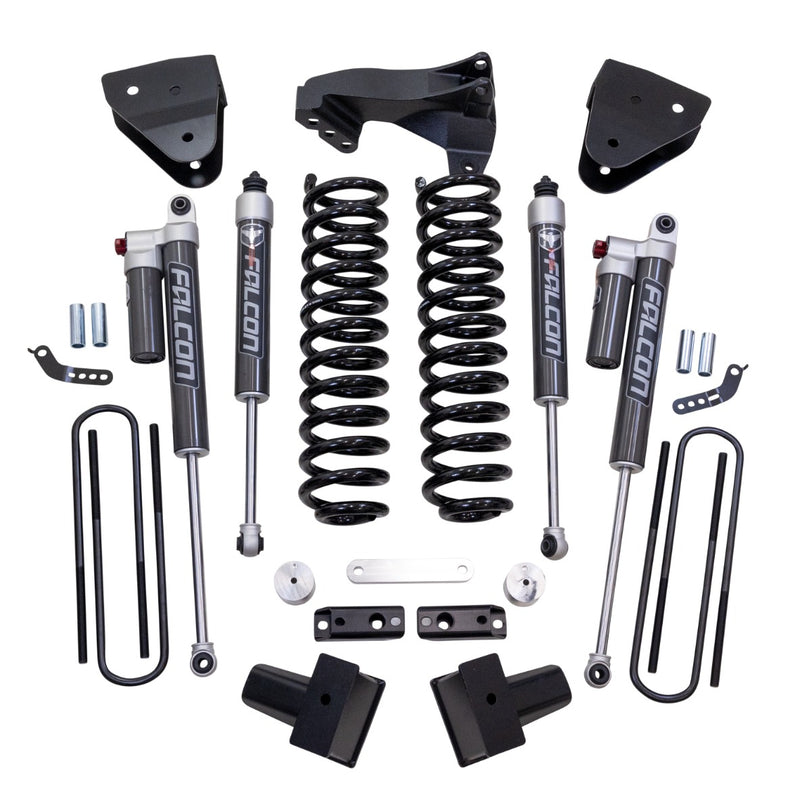 ReadyLIFT Coil Spring Suspension System, full kit on a studio background: coil springs, four Falcon shocks, track bar bracket, rear blocks, U-bolts and hardware on white
