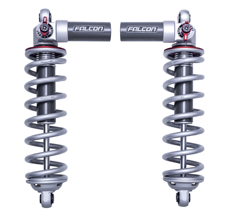ReadyLIFT Coilover Suspension System, full kit on a studio background: pair of Falcon 3.3 coilovers with silver springs and piggyback reservoirs on a black background