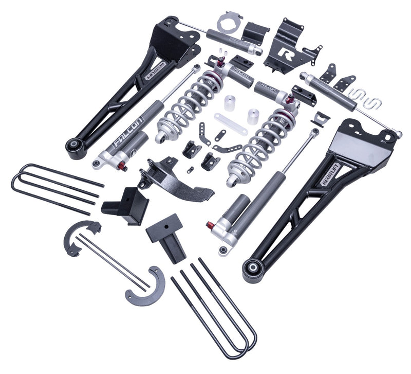 ReadyLIFT Coilover Suspension System, full kit on a studio background: ReadyLIFT Super Duty coilover kit with radius arms, Falcon shocks and hardware laid out at an angle on white