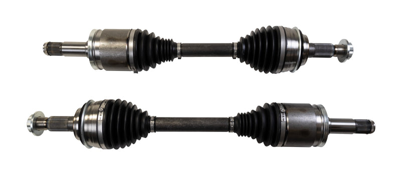 Close-up of the ReadyLIFT High-Performance CV Axle Kit: two front CV axle shafts with black boots on white