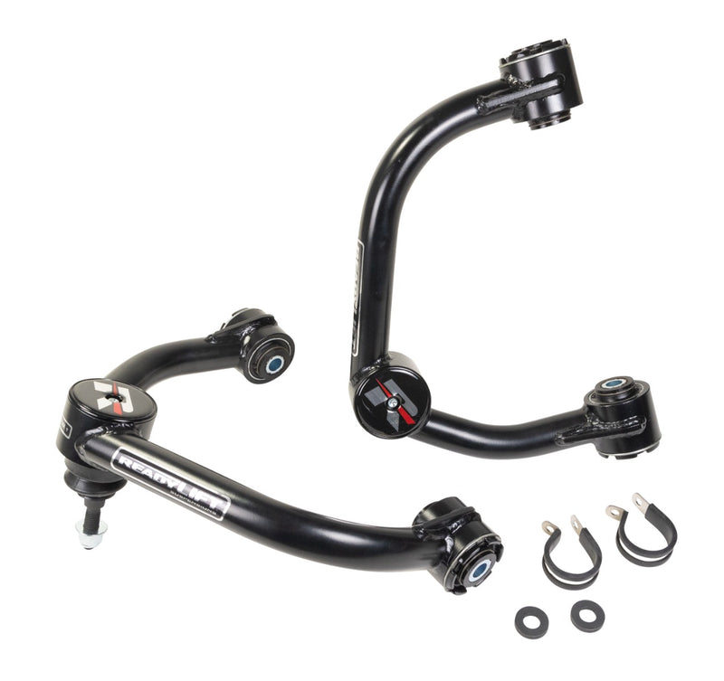 ReadyLIFT Leveling and Big Lift Upper Control Arms, full kit on a studio background: two black ReadyLIFT tubular upper control arms with line clamps and washers on white