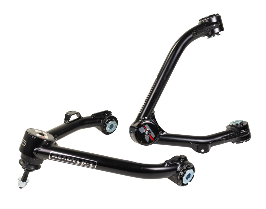 ReadyLIFT Leveling and Big Lift Upper Control Arms, full kit on a studio background: two black ReadyLIFT tubular upper control arms with red R caps on a white background