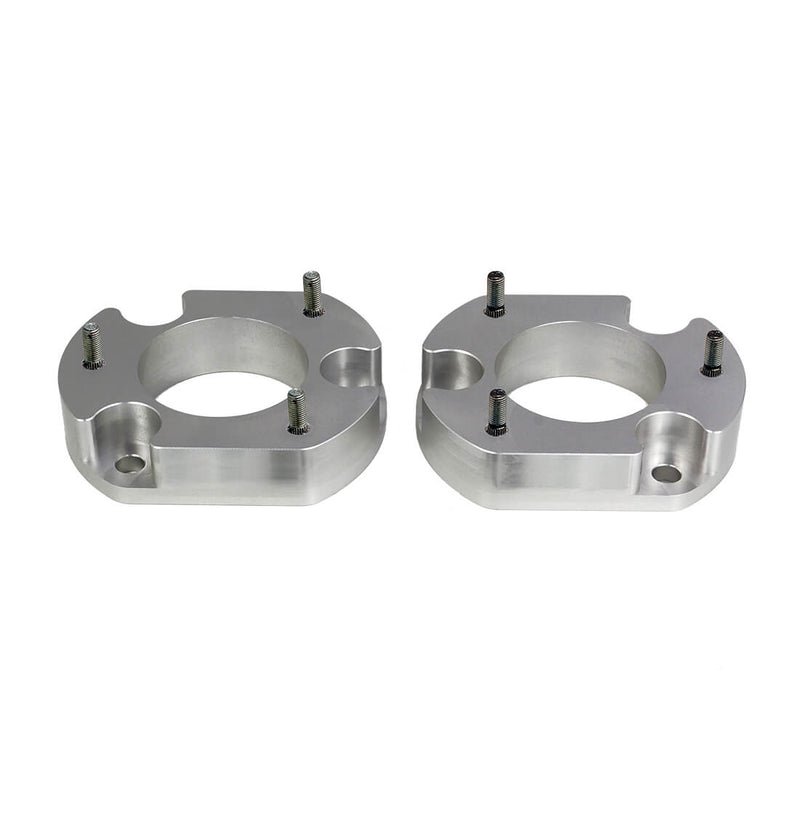 ReadyLIFT Leveling Kit, full kit on a studio background: pair of machined aluminum strut spacers with studs on white
