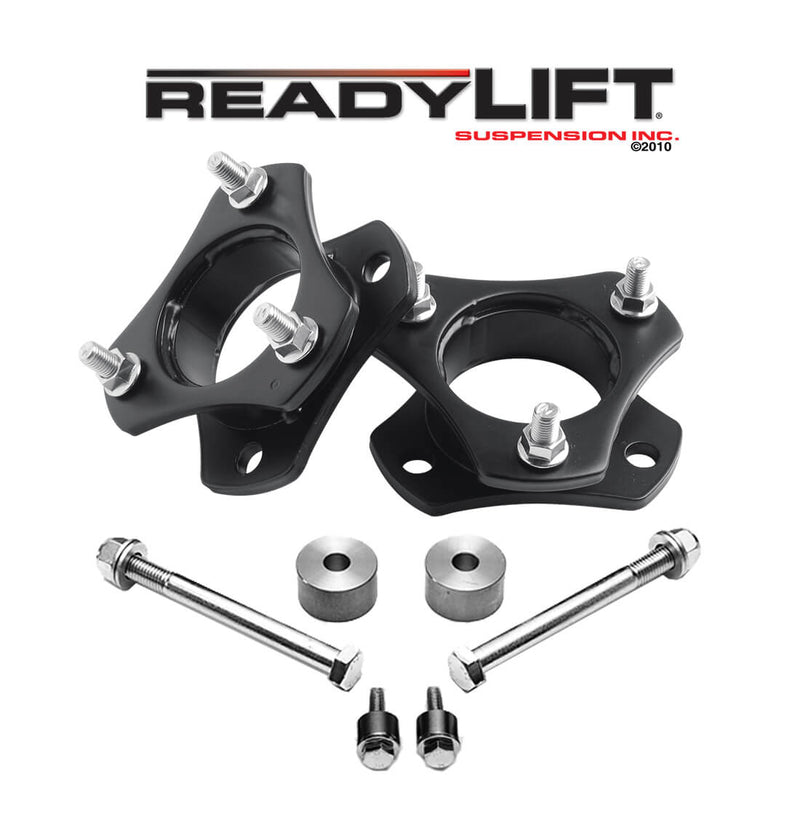 ReadyLIFT Leveling Kit, full kit on a studio background: two black strut spacers with long bolts, diff drop spacers and bump stops under a ReadyLIFT logo on white