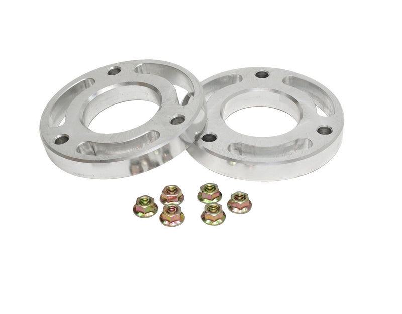 ReadyLIFT Leveling Kit, full kit on a studio background: two machined aluminum spacer rings with eight flange nuts on white