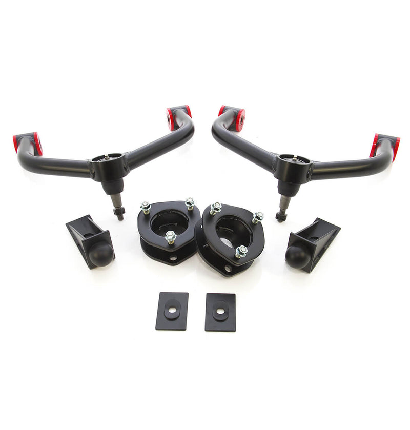 ReadyLIFT Leveling Kit, full kit on a studio background: two tubular upper control arms with black strut spacers and bump stop spacers on white