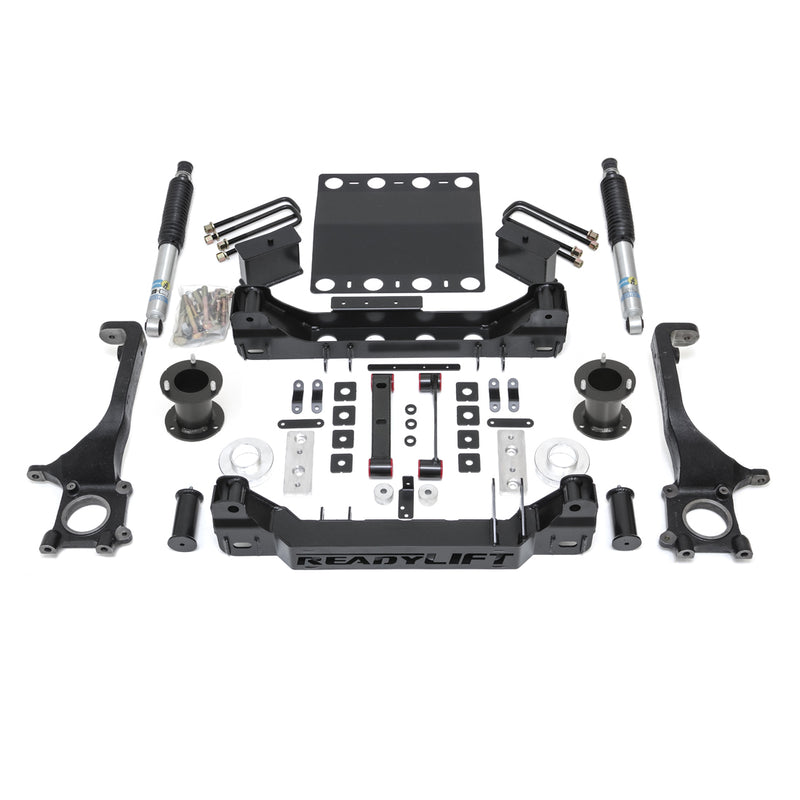 ReadyLIFT Lift Kit, full kit on a studio background: ReadyLIFT 6" Tacoma kit with knuckles, crossmembers, skid plate, spacers, blocks, U-bolts and Bilstein shocks on white