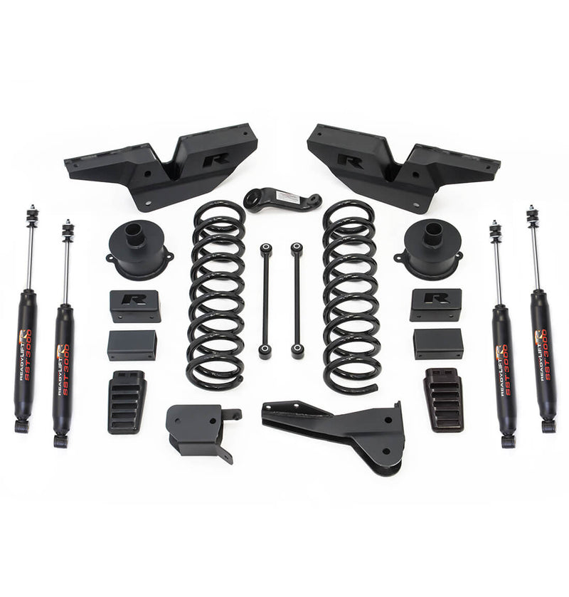 ReadyLIFT Lift Kit, full kit on a studio background: ReadyLIFT Ram 2500 kit with radius arm brackets, coil springs, spacers, blocks, links and four SST3000 shocks on white