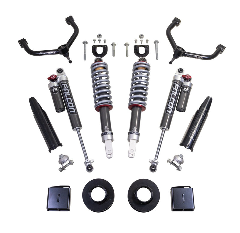 ReadyLIFT Lift Kit, full kit on a studio background: two black upper control arms, two Falcon coilovers, two Falcon rear shocks with reservoirs, spacers and brackets on white