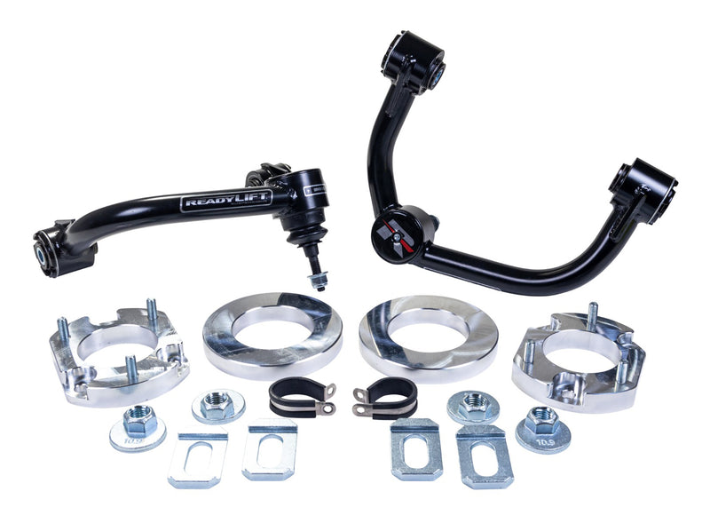 ReadyLIFT Lift Kit, full kit on a studio background: two ReadyLIFT upper control arms with aluminum spacers, rings, clamps and tabs on white