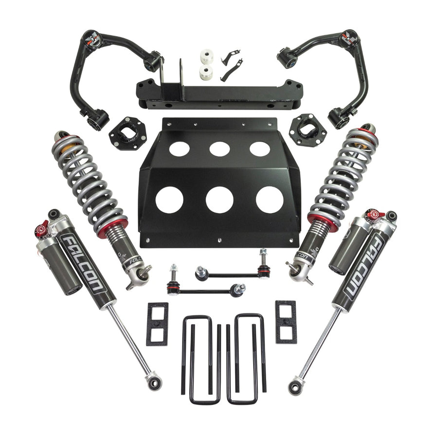 ReadyLIFT Lift Kit, full kit on a studio background: two upper control arms, a skid plate, crossmember, two Falcon coilovers, two rear shocks, blocks and U-bolts on white