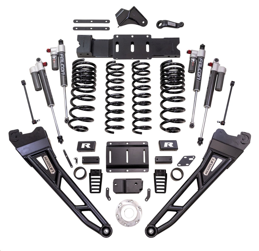 ReadyLIFT MAX3.3 Suspension System, full kit on a studio background: ReadyLIFT Ram 2500 kit with radius arms, coil springs, Falcon 3.3 reservoir shocks, crossmember and hardware on white