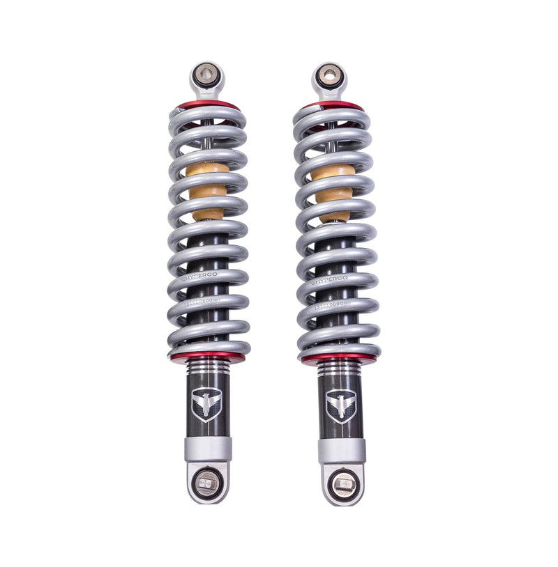 ReadyLIFT Premium Falcon 2.1 Standalone Front Pair, full kit on a studio background: pair of Falcon 2.1 coilovers with silver springs (Hyperco marked) and red collars on white