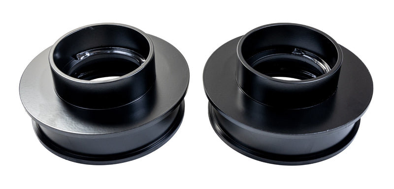 ReadyLIFT Spacer Kit, full kit on a studio background: two black 2" rear coil spring spacers side by side on white