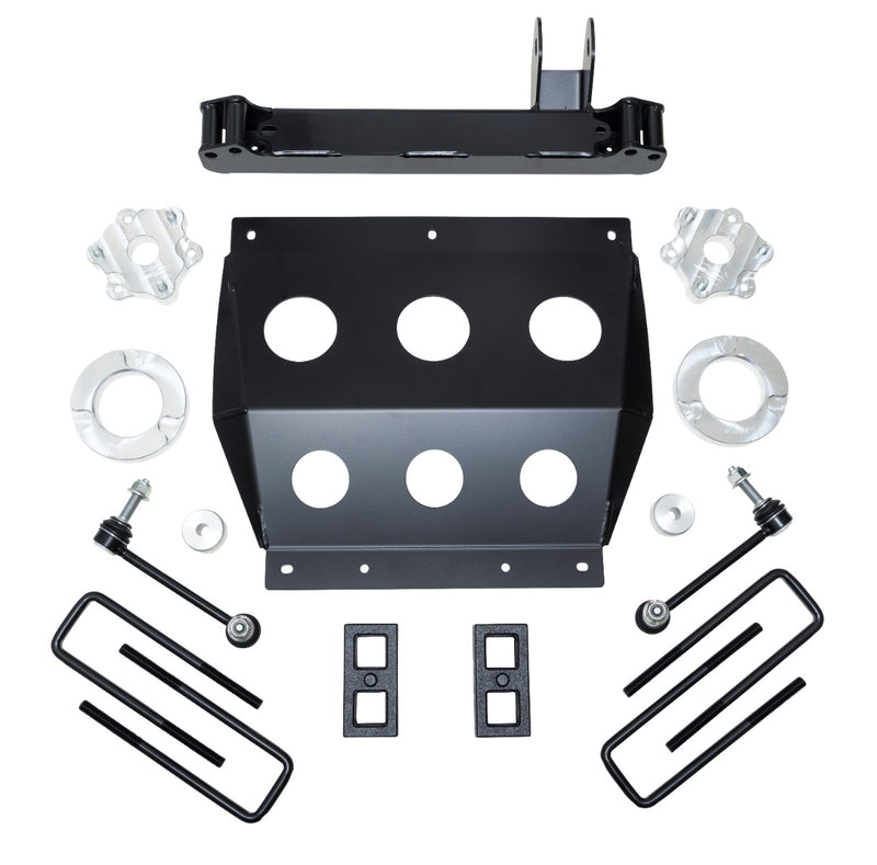 ReadyLIFT SST Lift Kit, full kit on a studio background: A black skid plate, crossmember brace, aluminum spacers, sway bar links, rear blocks and U-bolts on white