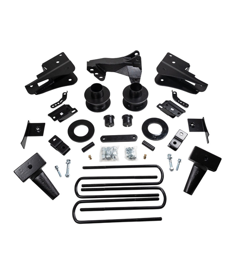 ReadyLIFT SST Lift Kit, full kit on a studio background: black brackets, coil spacers, tapered rear blocks, U-bolts and hardware bags laid out on white
