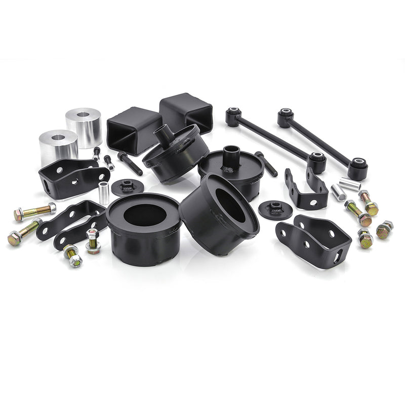 ReadyLIFT SST Lift Kit, full kit on a studio background: black coil spacers, aluminum bump stop spacers, brackets, sway bar links and bolts on white
