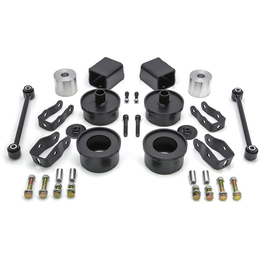 ReadyLIFT SST Lift Kit, full kit on a studio background: black coil spacers, aluminum bump stop spacers, brackets, sway bar links and bolts on white