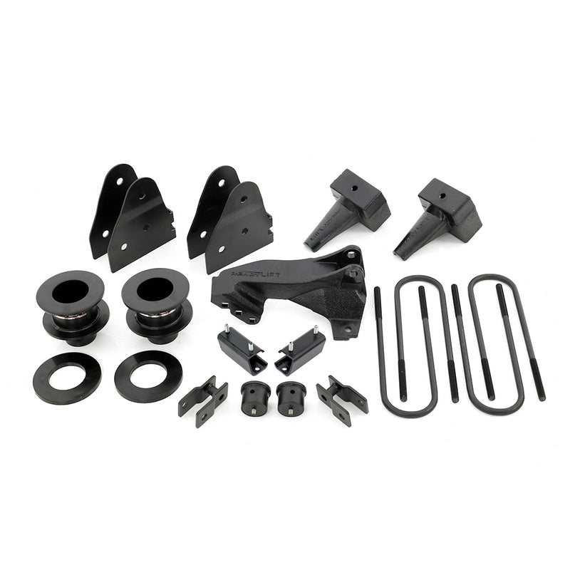 ReadyLIFT SST Lift Kit, full kit on a studio background: coil spacers, track bar bracket, shock brackets, tapered rear blocks and U-bolts on white