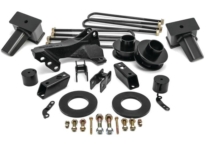 ReadyLIFT SST Lift Kit, full kit on a studio background: coil spacers, track bar bracket, tall fabricated rear blocks, U-bolts and hardware on white