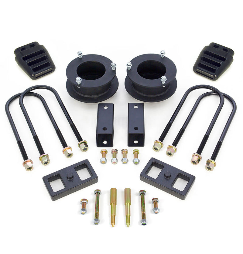 ReadyLIFT SST Lift Kit, full kit on a studio background: front coil spacers, bump stops, brackets, U-bolts, two 1" rear blocks and hardware on white