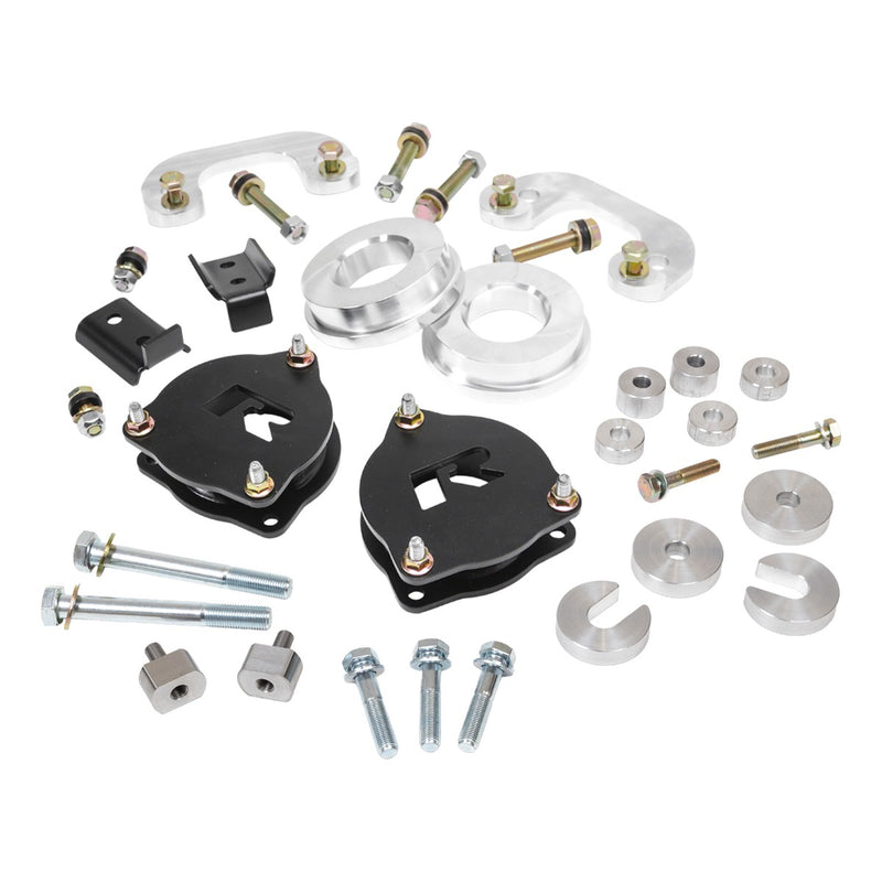 ReadyLIFT SST Lift Kit, full kit on a studio background: two black R strut spacers, aluminum rear spacers, brackets, long bolts and washers on white