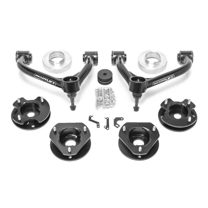 ReadyLIFT SST Lift Kit, full kit on a studio background: two black ReadyLIFT upper control arms, black strut spacers, aluminum spacers, brackets and hardware on white