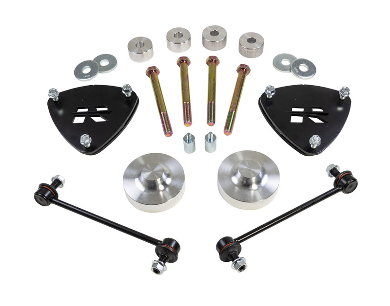 ReadyLIFT SST Lift Kit, full kit on a studio background: two black strut spacers, aluminum rear spacers, sway bar links, long bolts and washers on white