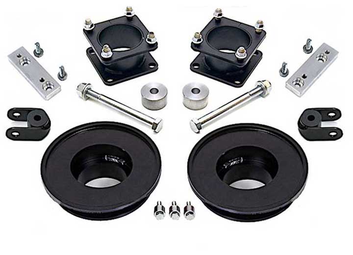 ReadyLIFT SST Lift Kit, full kit on a studio background: two black strut spacers, two black rear coil spacers, aluminum brackets, bolts and shackles on white