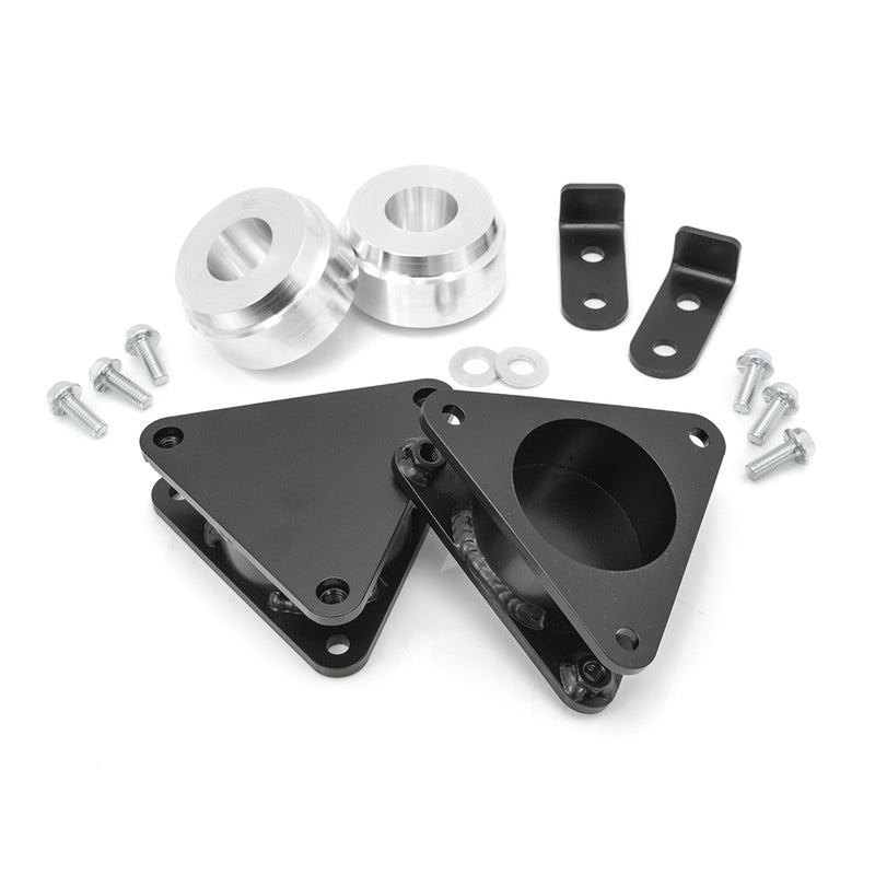 ReadyLIFT SST Lift Kit, full kit on a studio background: two black triangular strut spacers, two aluminum rear spacers, brackets and bolts on white