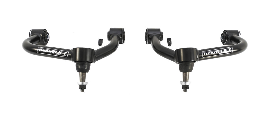 ReadyLIFT SST UCA, full kit on a studio background: A pair of black ReadyLIFT upper control arms with ball joints side by side on white